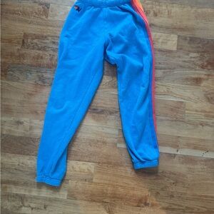 Aviator Nation Blue Joggers with Rainbow Stripes